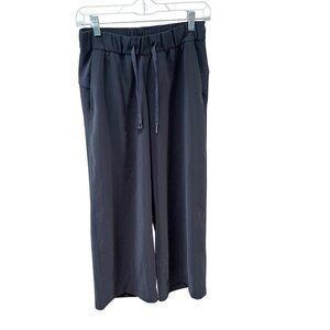 Lululemon On the‎ Fly Wide-Leg 7/8 Pant *Woven - Sz. 4